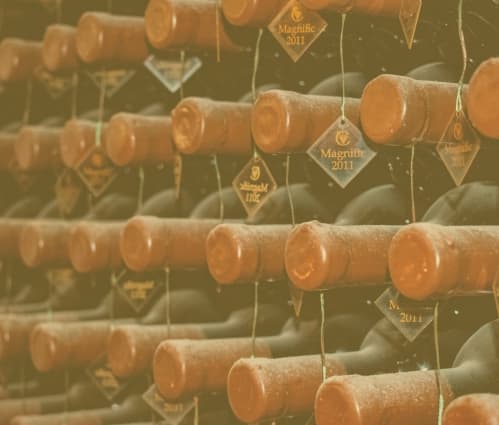 What is the difference between auction and market prices in fine wine investment - Featured image